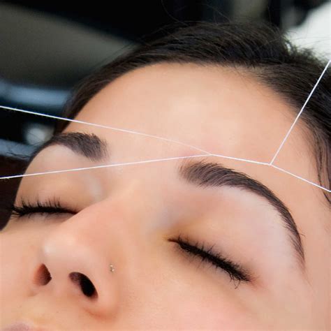 Unlock the magic of perfectly shaped brows with our expert threading services at Salin and Spa